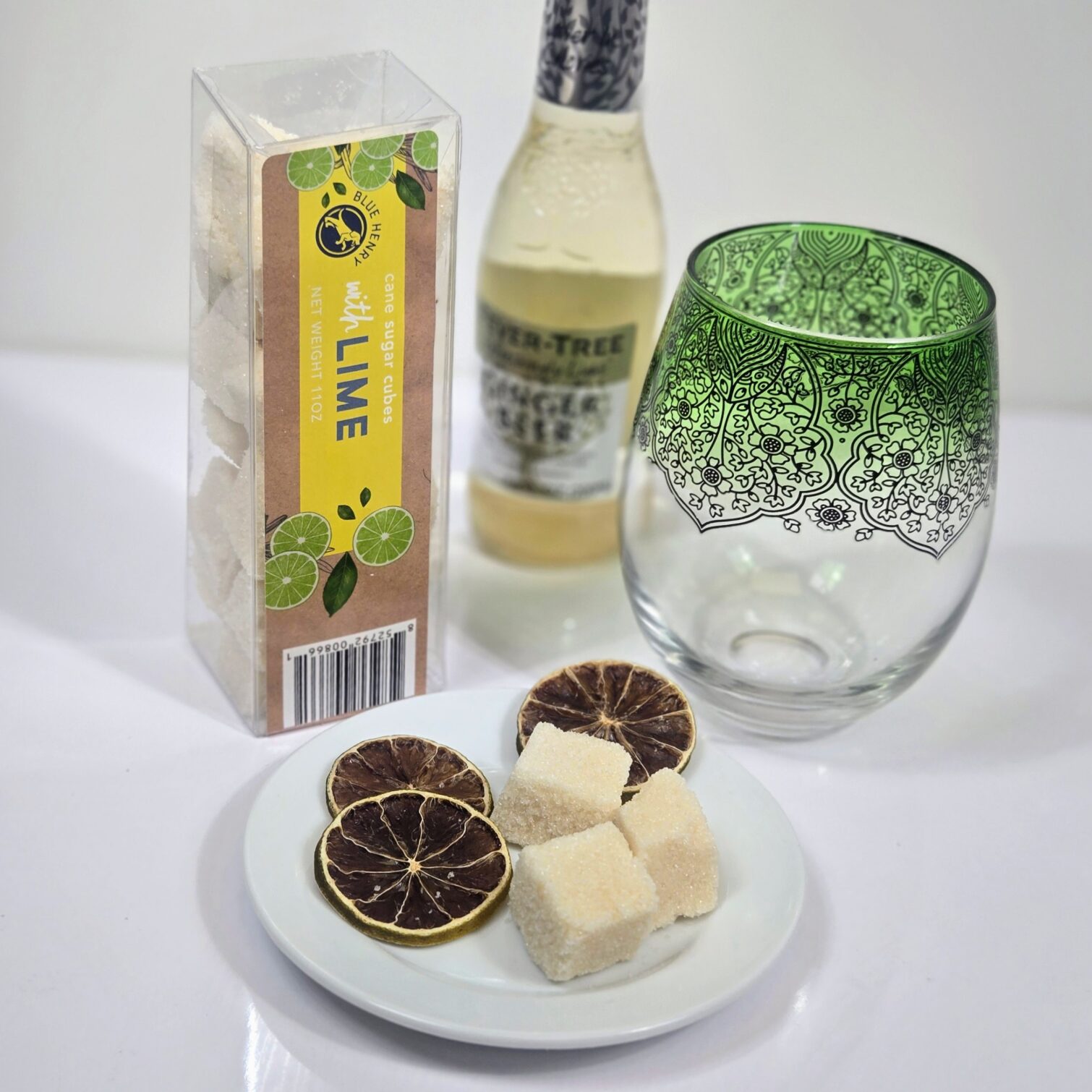 Box of BlueHenry Cane Sugar Cubes infused with Lime accompanied with Dehydrated Lime slices and Ginger Beer
