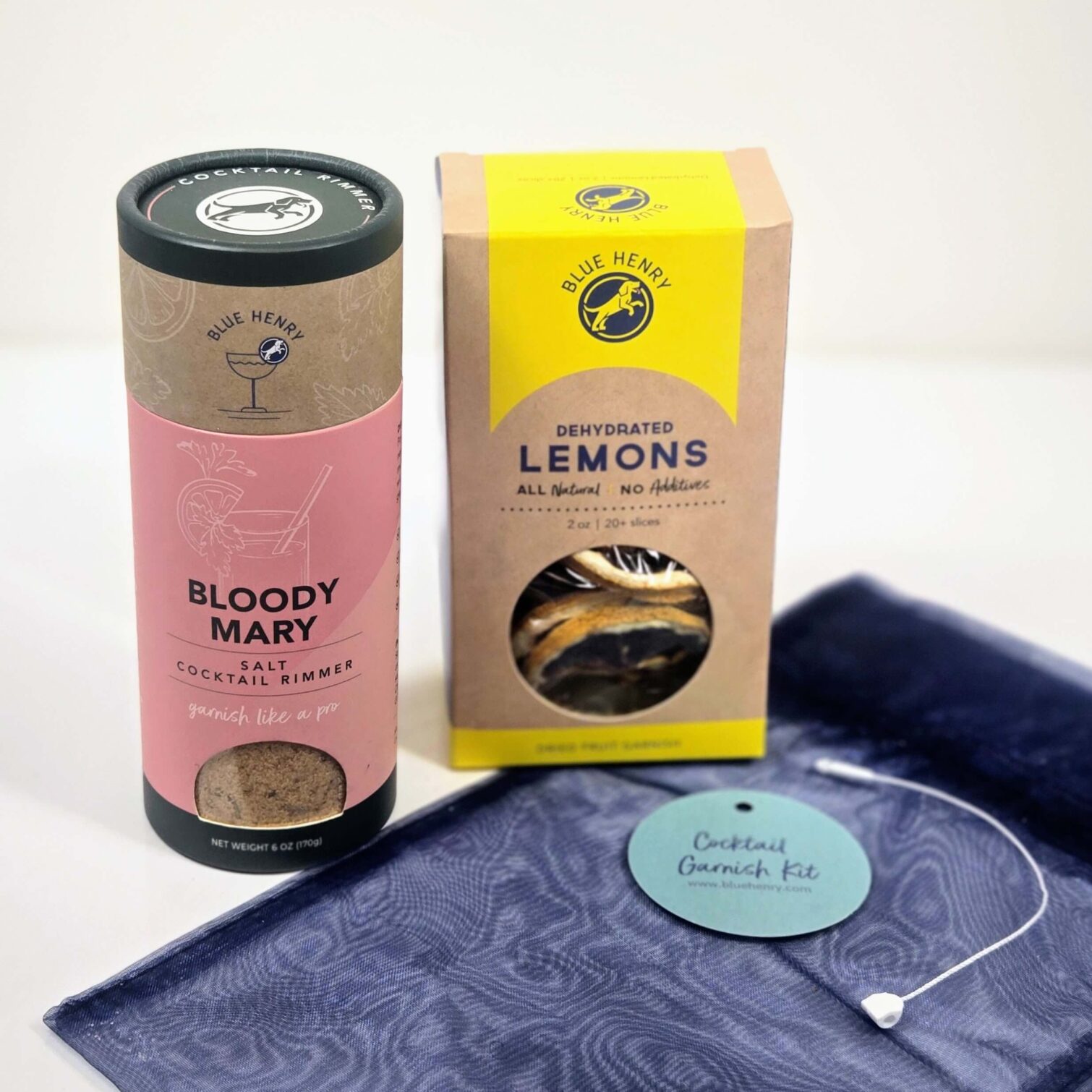 A BlueHenry gift set, which includes a box of Lemon slices and a tube of Bloody Mary Glass Rimming Salt. The set comes in a blue gift bag and hanging tag 