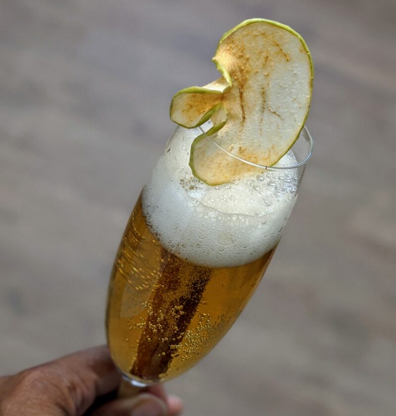 BlueHenry Warm Frost Cocktail with Apple Slice Garnish