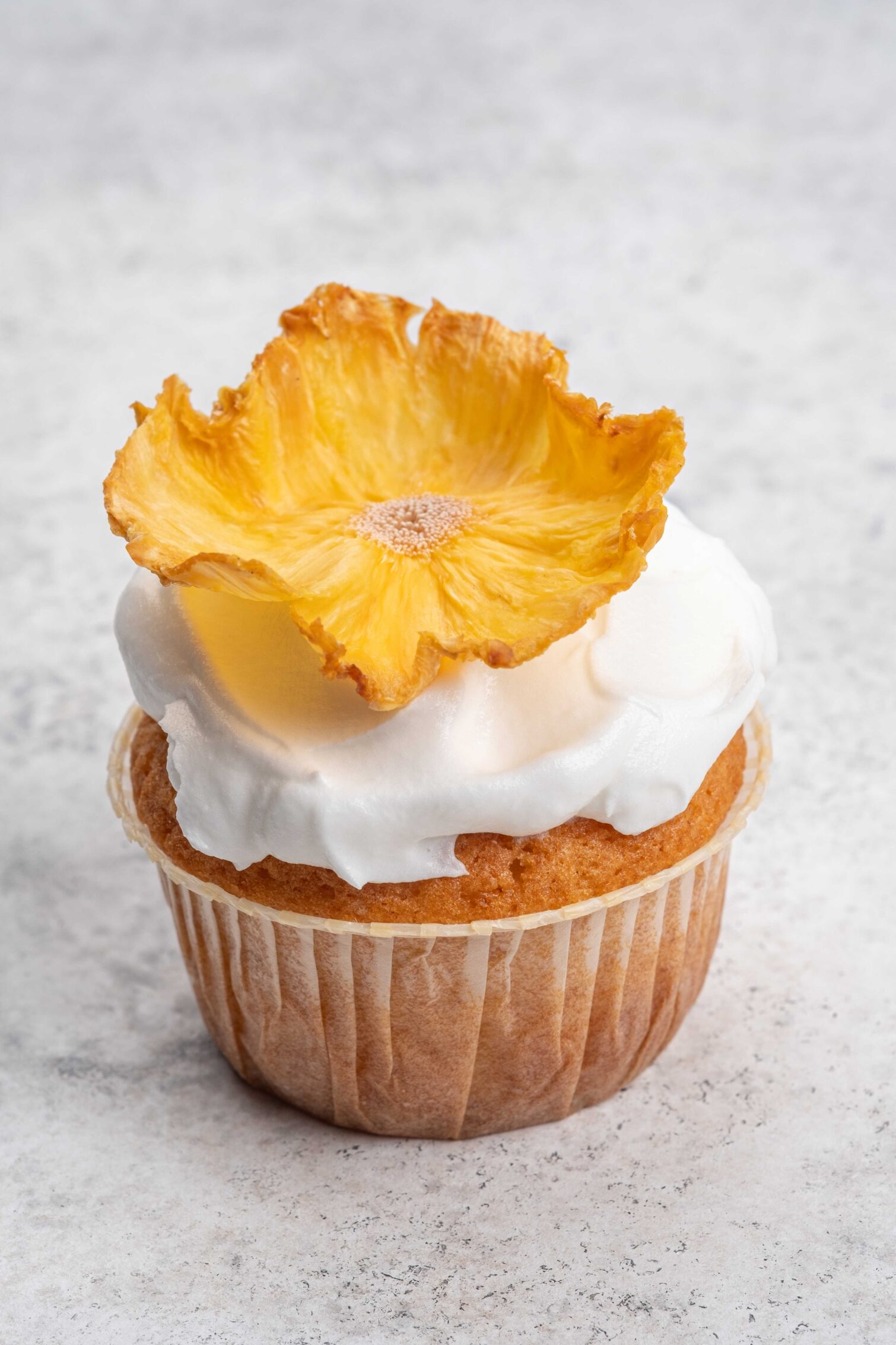 Cupcake garnished with BlueHenry Pineapple slice